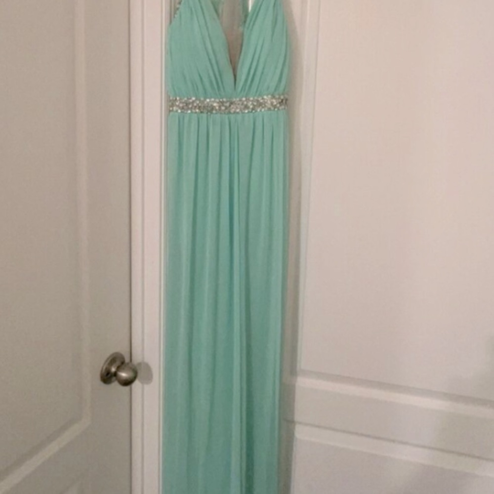 Beautiful long mint green prom dress. Size 13. Smoke free home. Only worn once